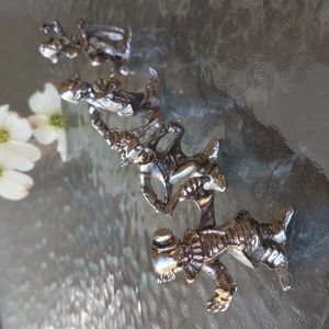 Vintage Nickel plated clowns set of 4